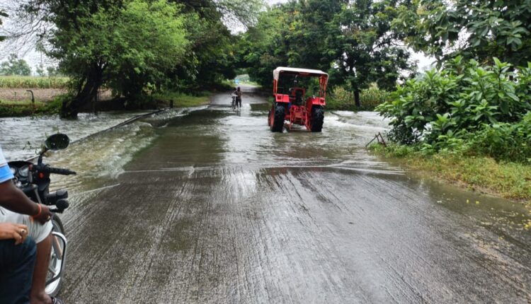 Flood flowing from the road near Pochampally Mutyalamma Temple