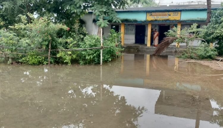 Aklur Govt School overlooking the pond